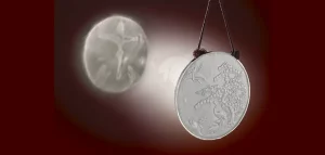 Eespejo japones de bronce y la imagen reflejada por este