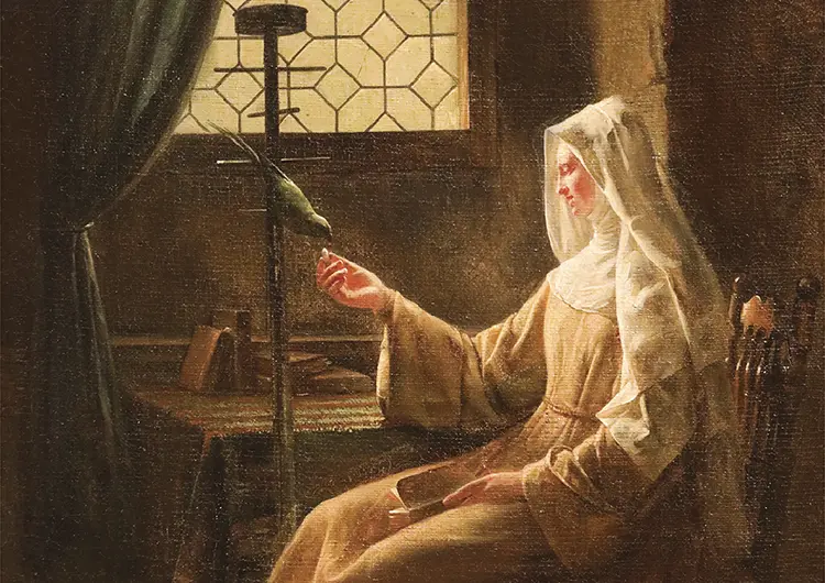 cloistered nun distracted in prayer while making her meditation.