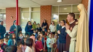 Praying before the Pilgrim Statue at the Santa Clara Nursery- Heralds of the Gospel