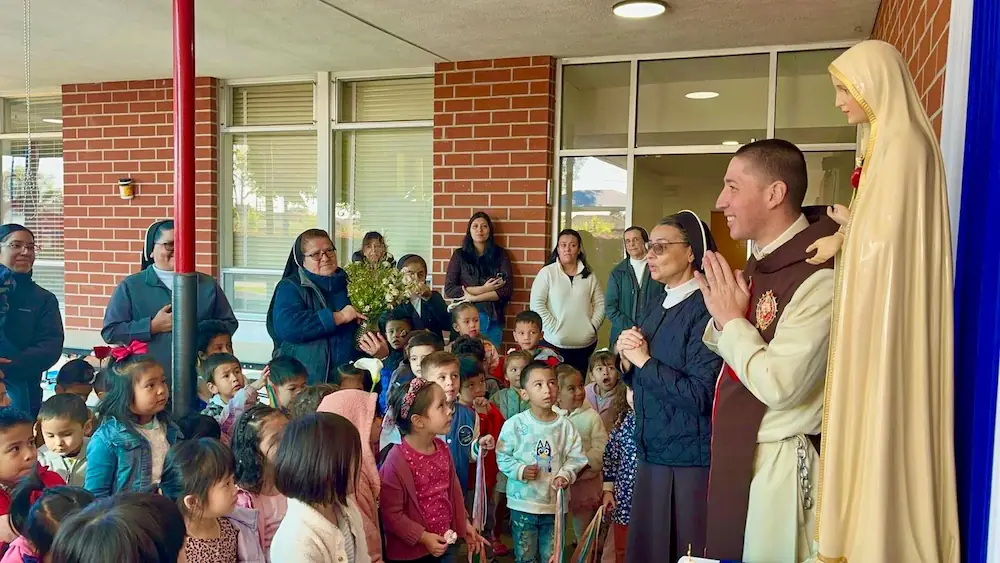 Praying before the Pilgrim Statue at the Santa Clara Nursery- Heralds of the Gospel