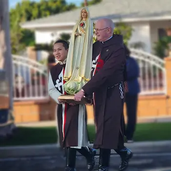 Heralds Missionaries visiting with the Pilgrim Statue in California