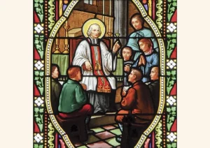 Stainglass of St. John Marie Vianney, the Curé of Ars, known for his holiness and dedication to the priesthood.