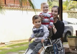 Mother at play with her children, representation of affection.